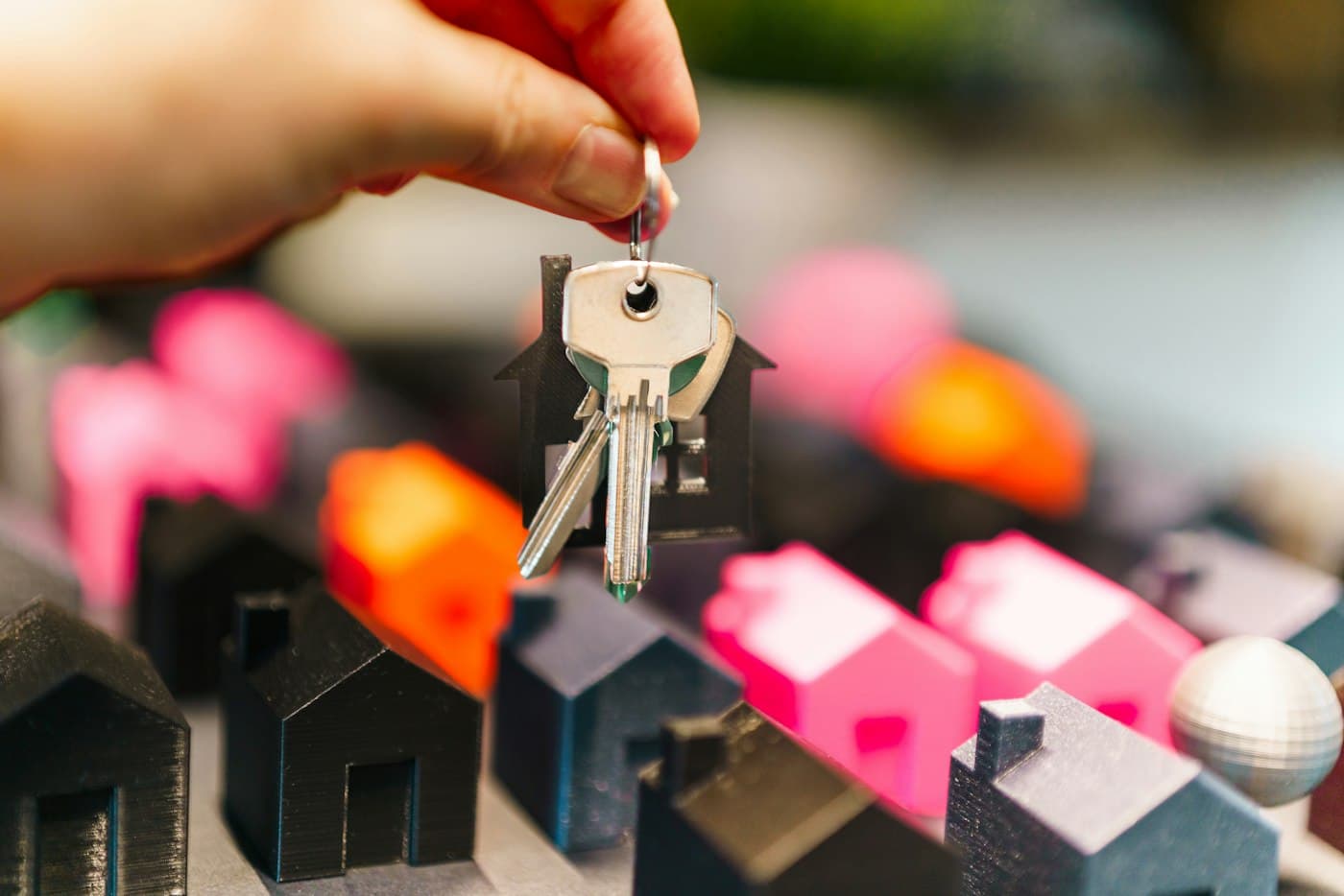 Keys handed over above model houses representing refinanced rentals